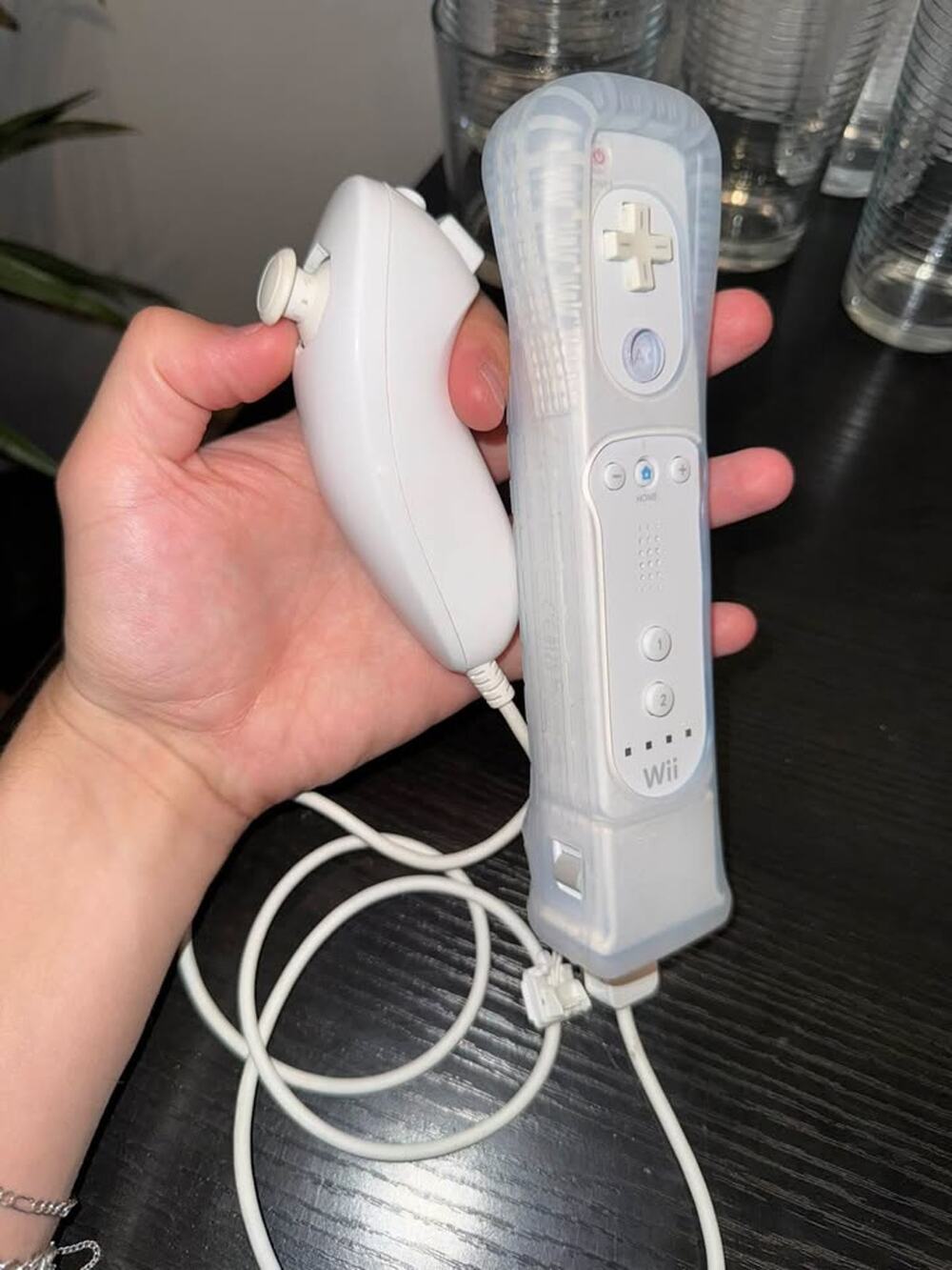 Nintendo Wii Remote with Nunchuk and Wii MotionPlus Adapter